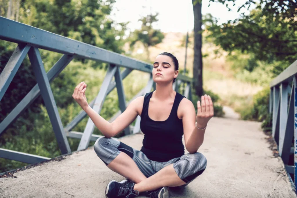 A girl doing yoga.