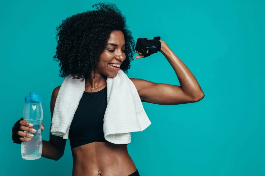 A black girl having great muscle strength.