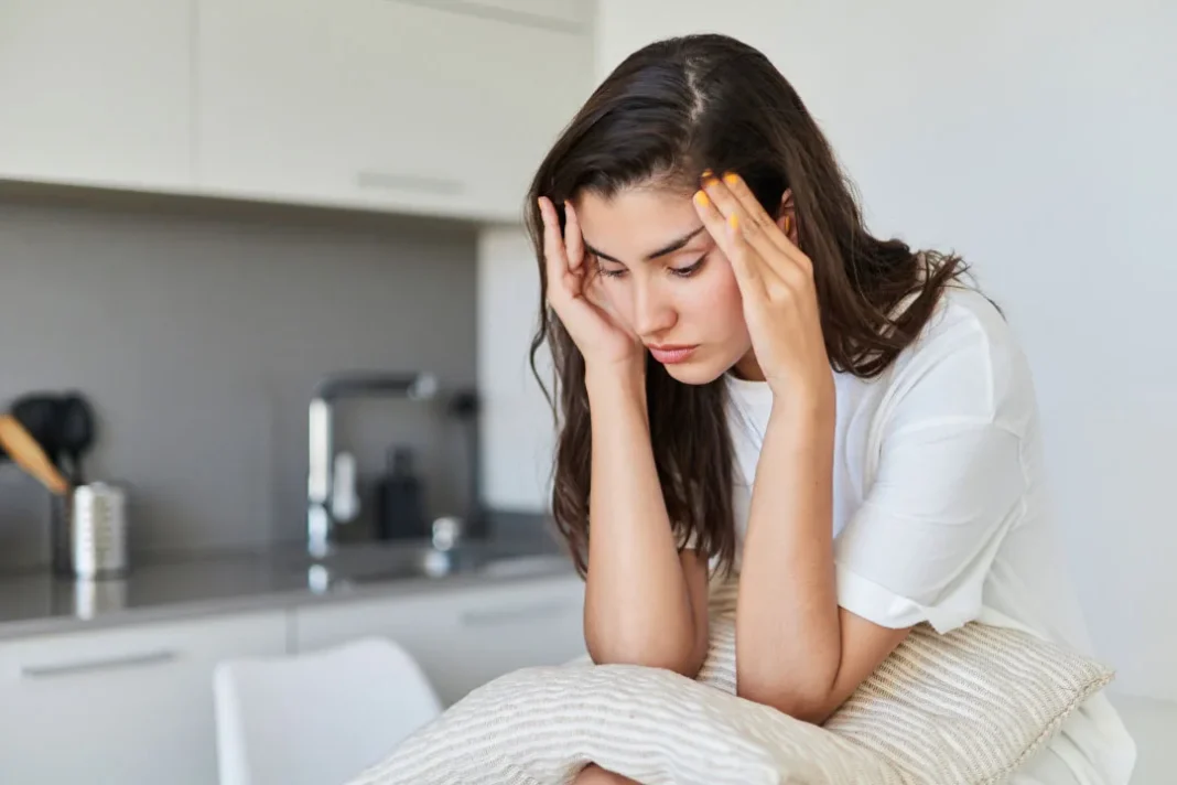 A young girl being upset.