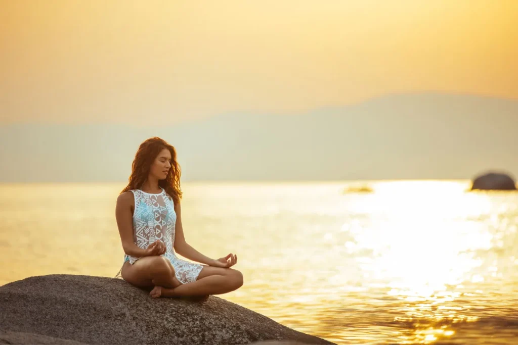 A young lady doing yoga posture.