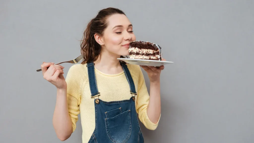 Lady having Double Chocolate Cake. 