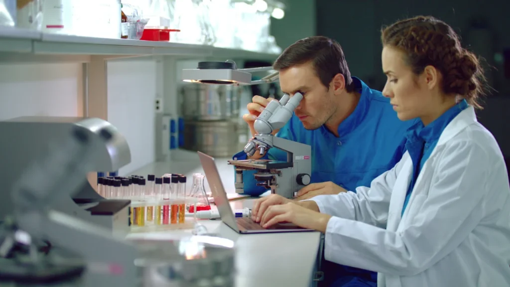 Two doctors checking supplements quality in lab